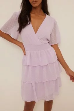 NA-KD Recycled Dobby Smocked Flounce Dress 20 NA-KD Recycled Dobby Smocked Flounce Dress -Party Dresses Sales na kd dobby smocked flounce dress 1100 004586 0368 02