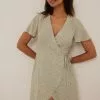 NA-KD Boho Overlap Mini Dress