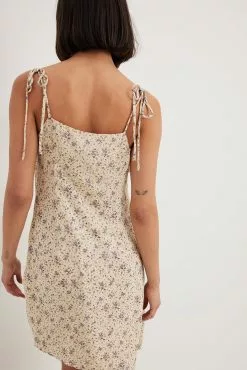 NA-KD Tie Shoulder Sheer Mini Dress -Party Dresses Sales tie shoulder sheer mini dress 1100 004592 920126269