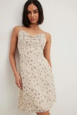 NA-KD Tie Shoulder Sheer Mini Dress -Party Dresses Sales tie shoulder sheer mini dress 1100 004592 920129229 2